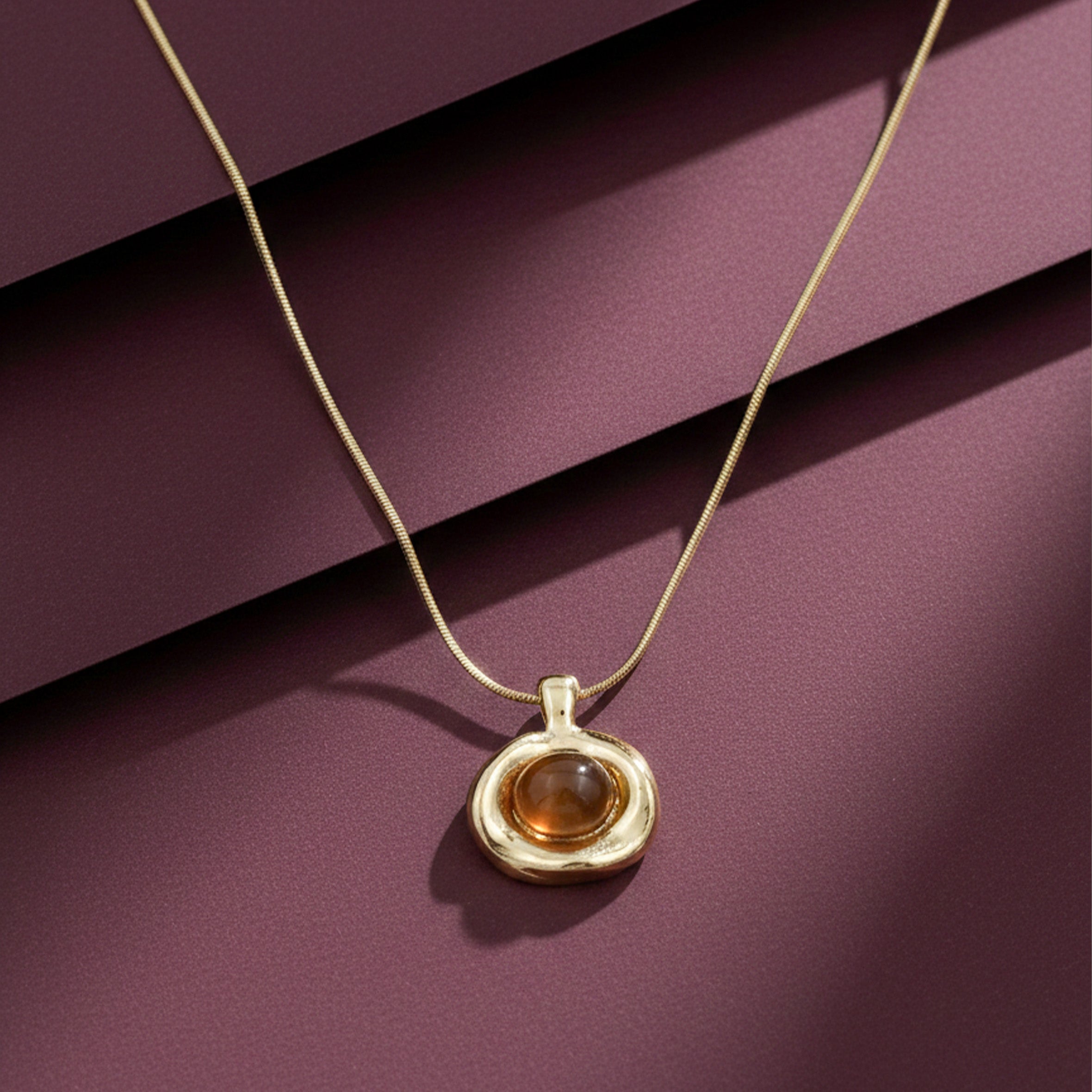 Amber Glow Gold Pendant Necklace