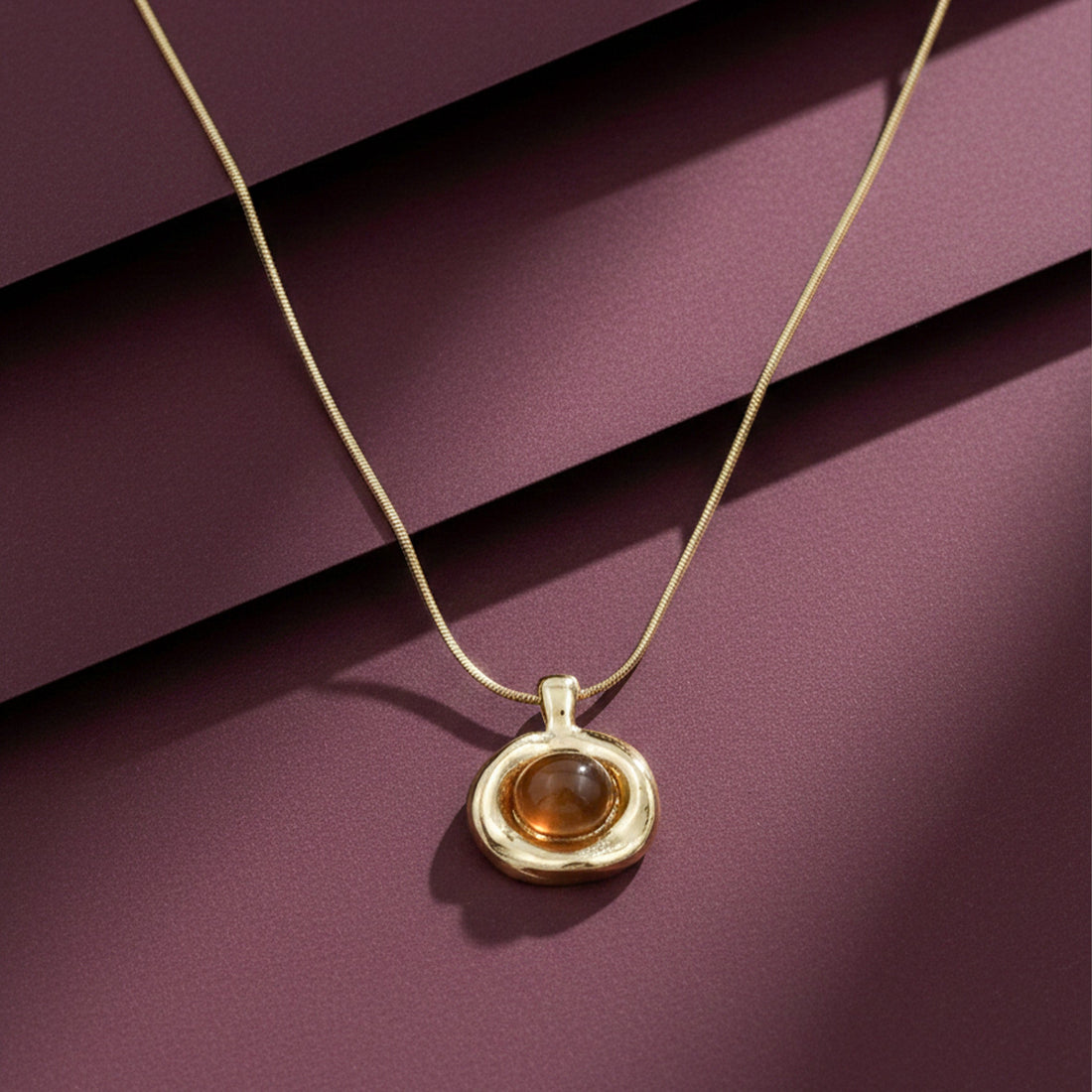 Amber Glow Gold Pendant Necklace