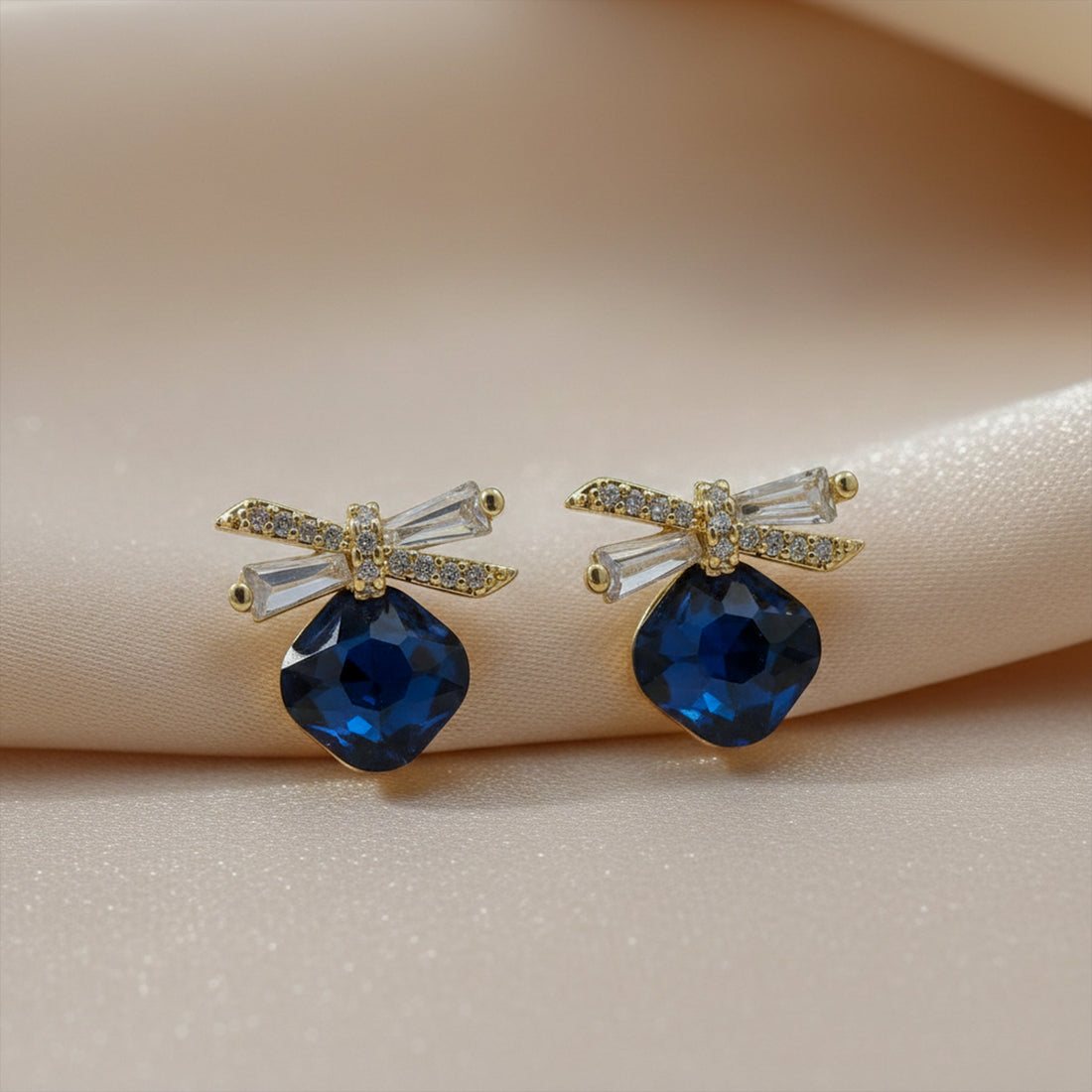 Sapphire Spark Bow Earrings