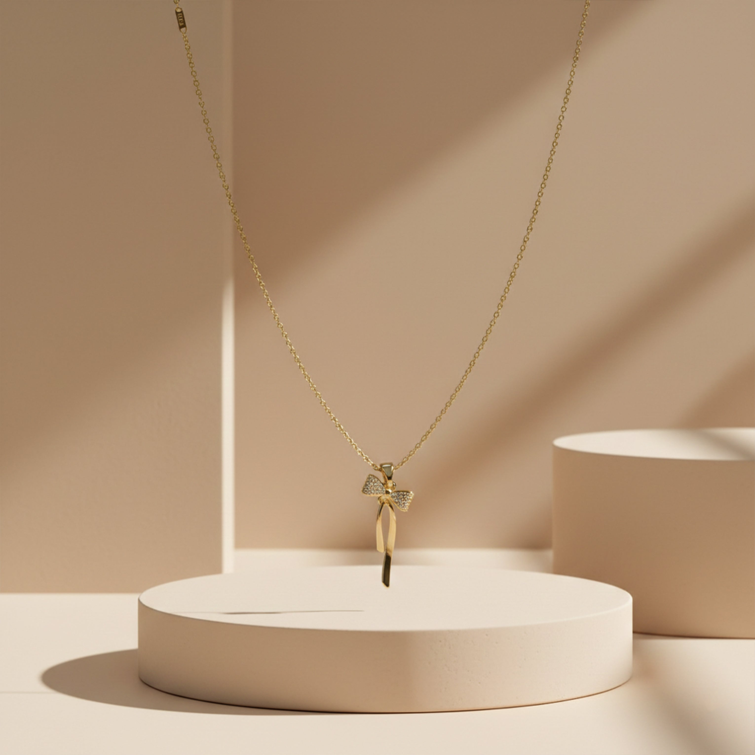 Elegant Gold Ribbon Bow Necklace