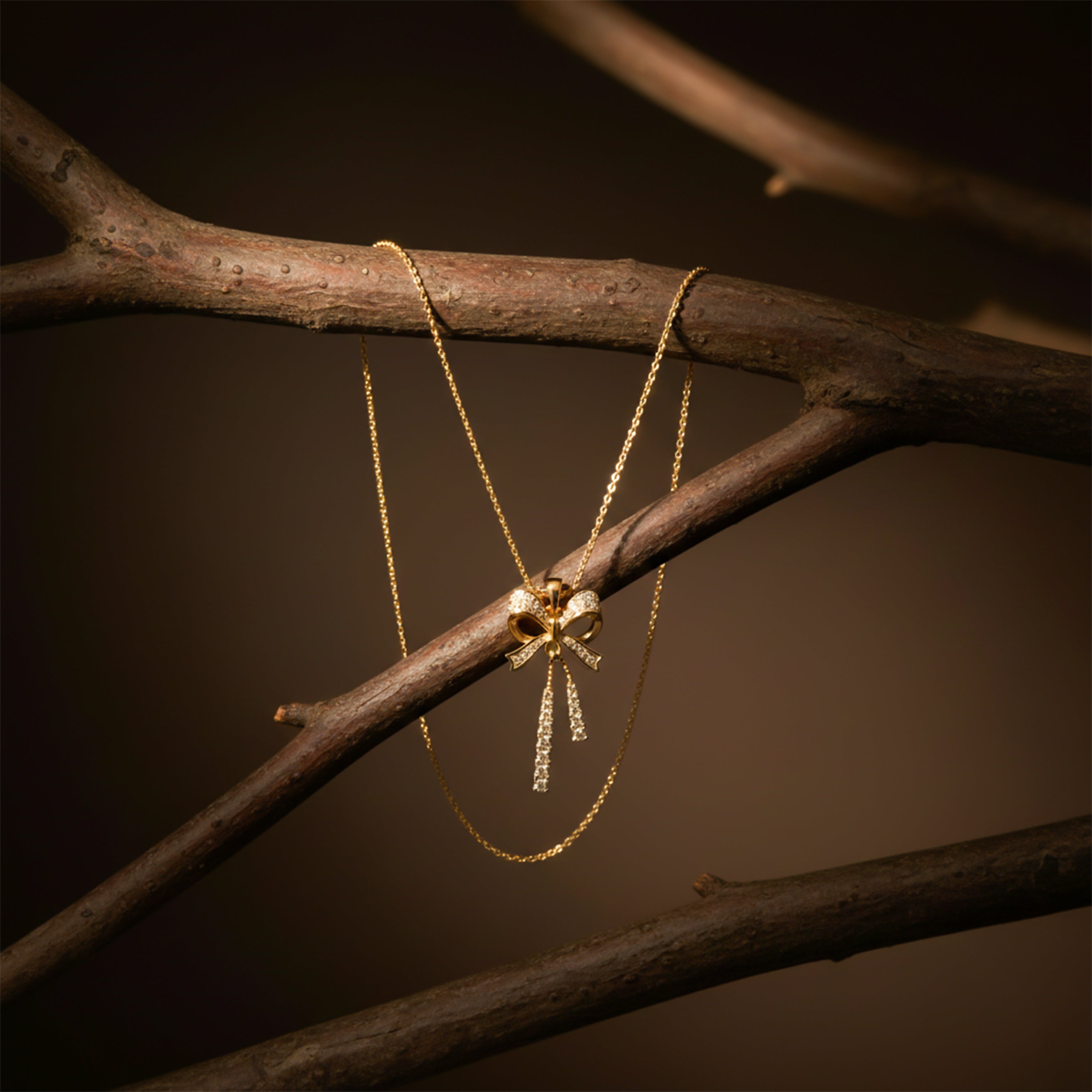 Elegant Gold Bow Pendant Necklace