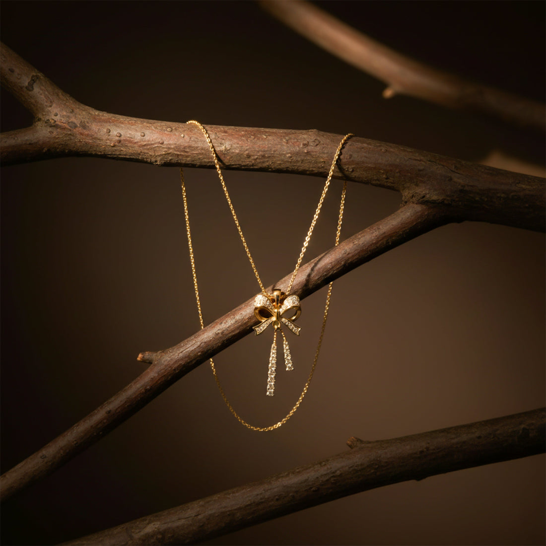 Elegant Gold Bow Pendant Necklace