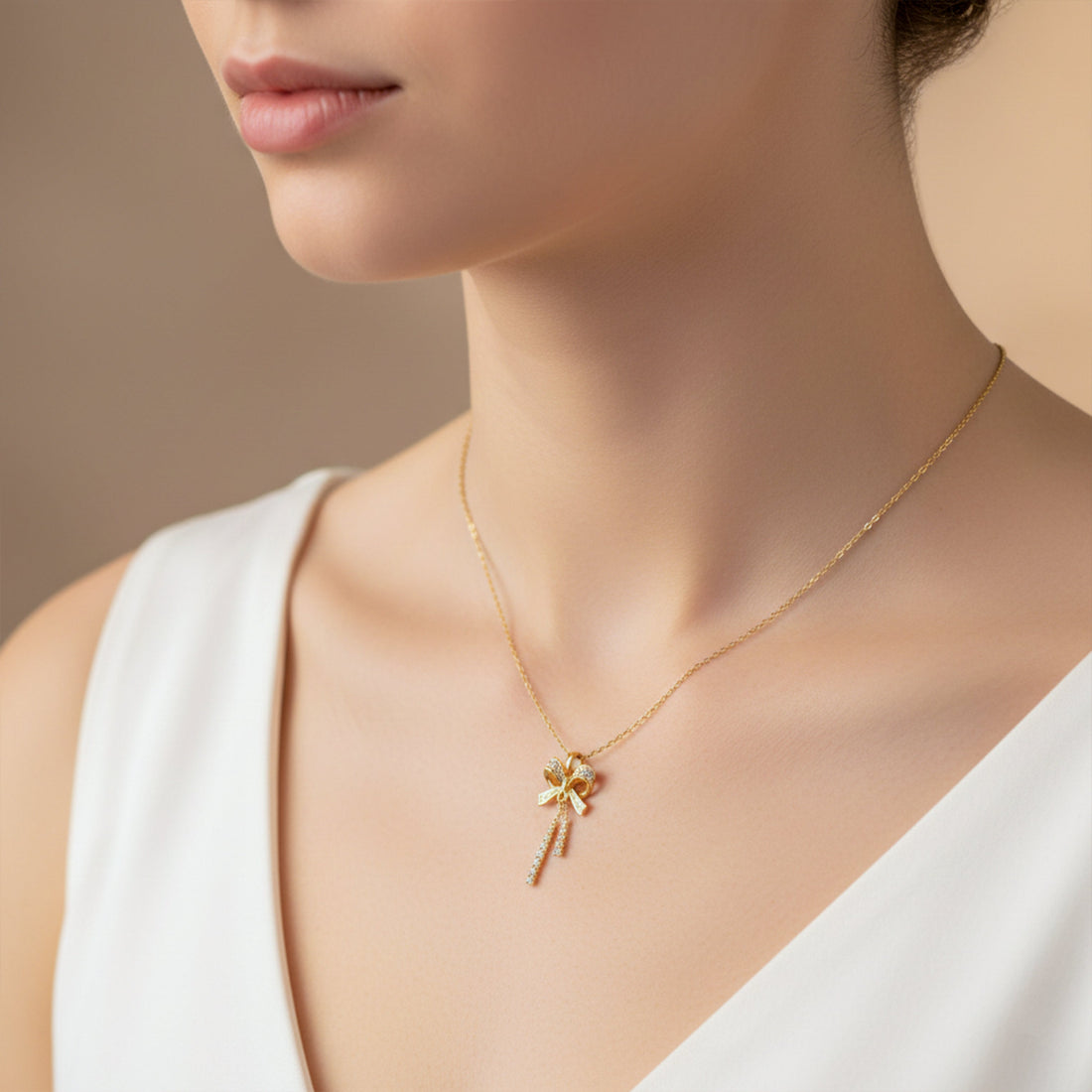 Elegant Gold Bow Pendant Necklace