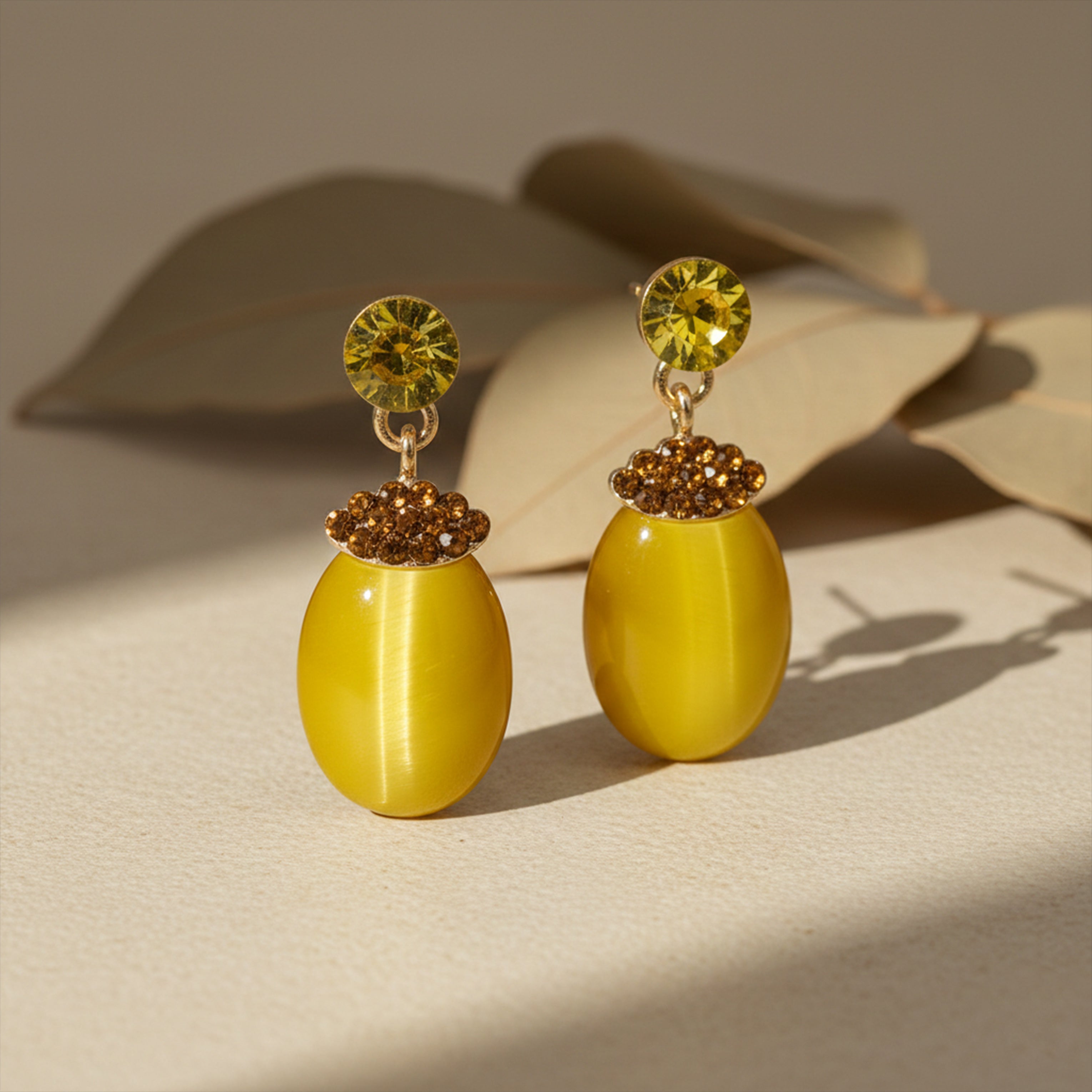 Sunlit Elegance Cat Eye Earrings
