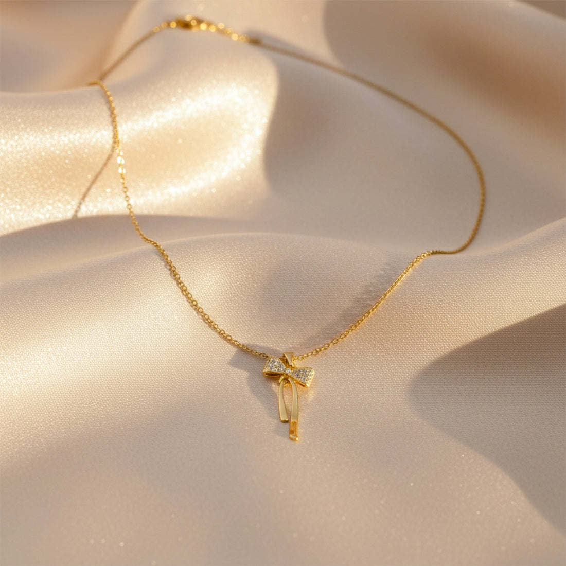 Elegant Gold Ribbon Bow Necklace