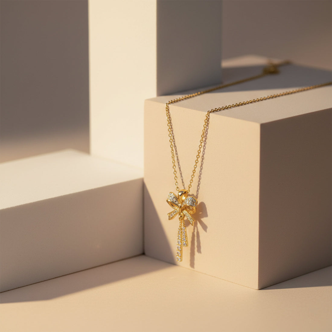 Elegant Gold Bow Pendant Necklace