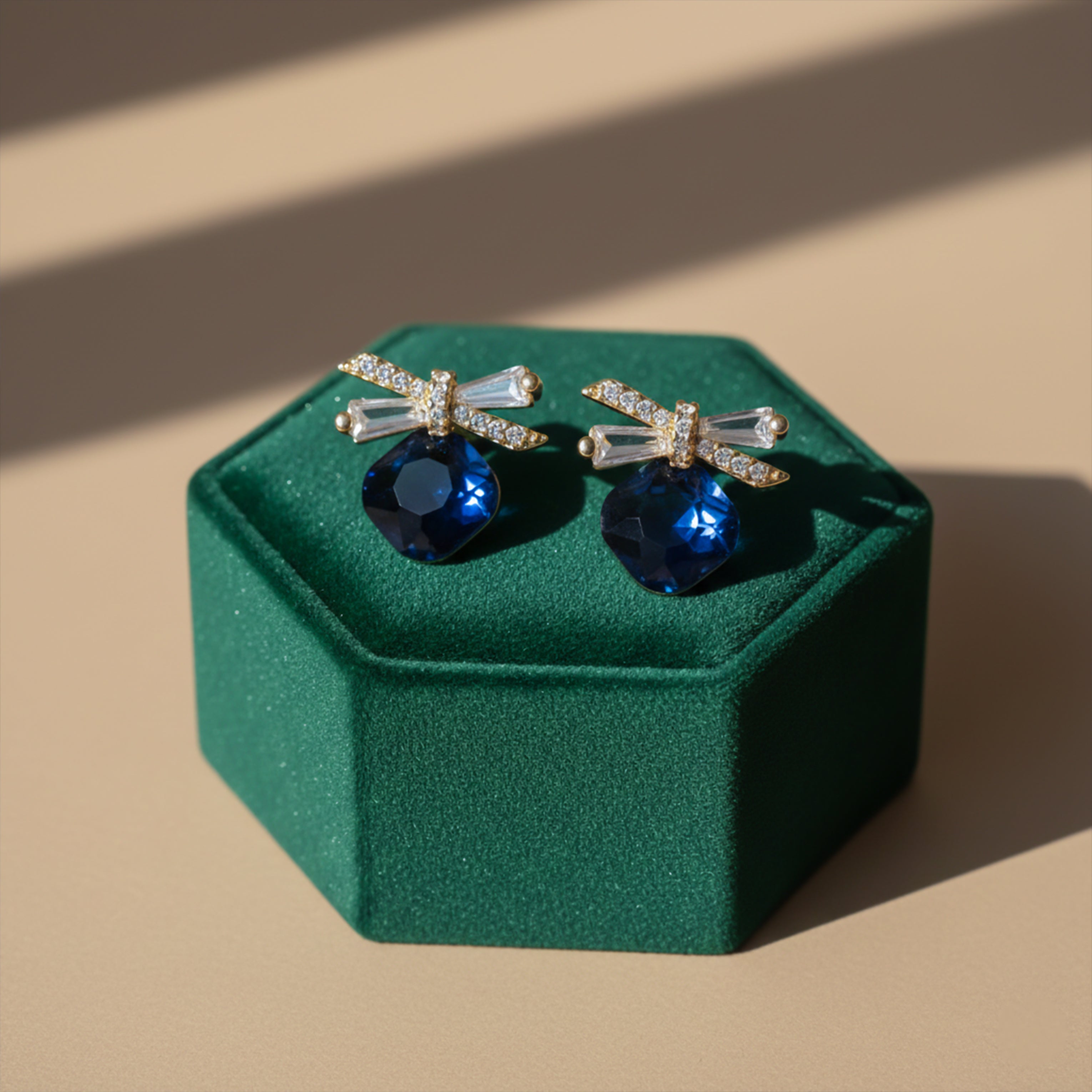 Sapphire Spark Bow Earrings